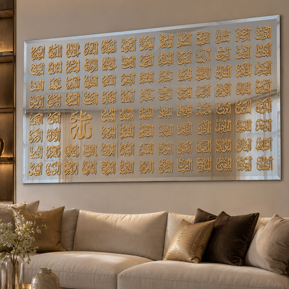 A large rectangular wall art piece with repeating gold geometric motifs on a light background, displayed above a beige sofa in a modern living room.