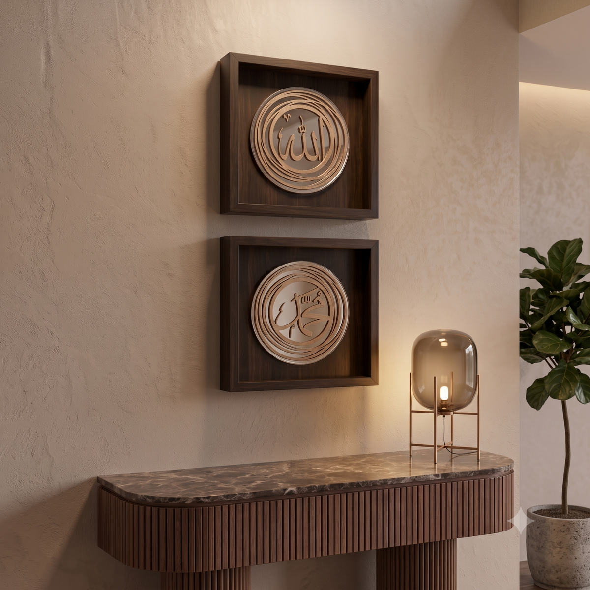Two square dark wood wall boxes with circular metallic Islamic calligraphy art pieces, mounted on a textured beige wall above a console table with a glass lamp and a potted plant.